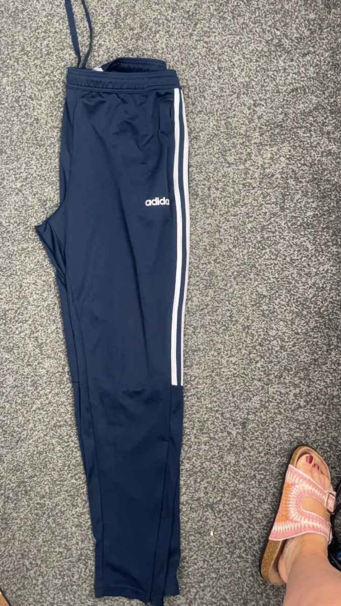 Nike navy track suit bottoms - Image 1