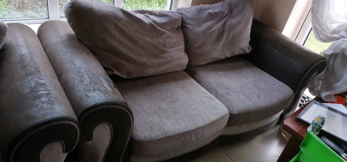 Two seater sofa bed and an armchair - Image 1