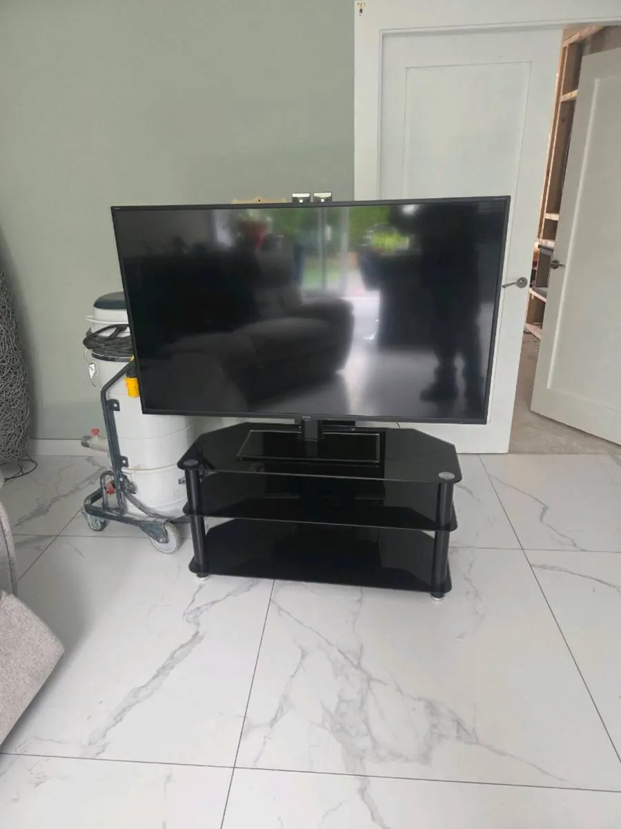 Tv and stand - Image 1