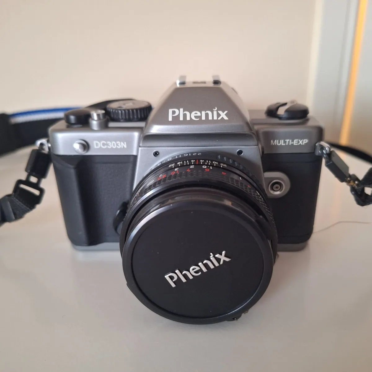 Phenix DC303N SLR Camera + Suntax 328 AZ Flash Set - Image 1