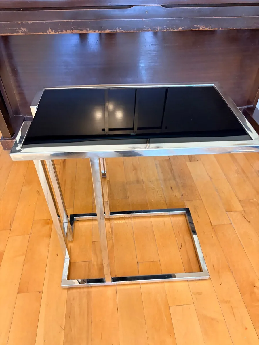 Metal and black glass coffee table - Image 1
