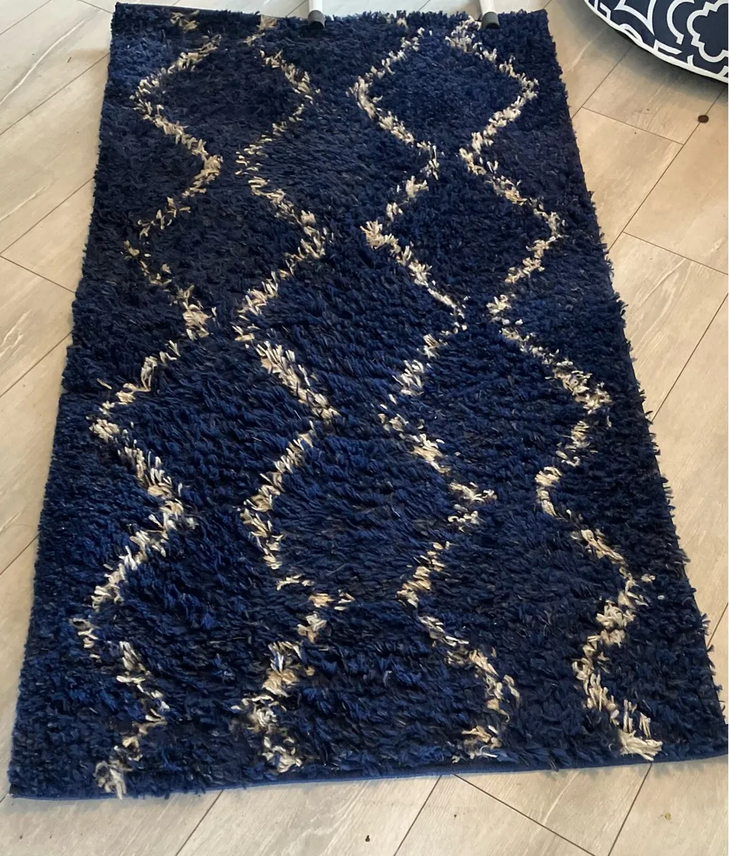 2 x Navy and white rugs