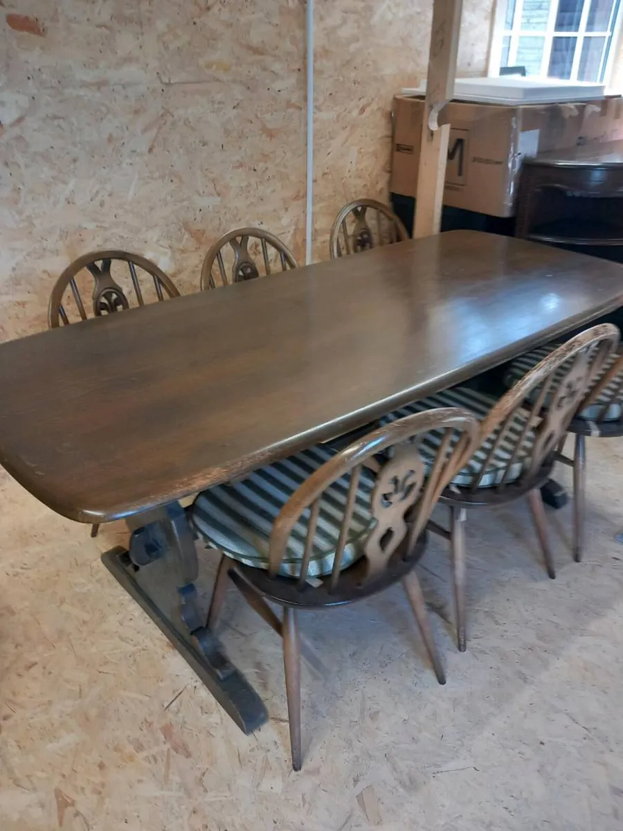 Ercol dining table and six chairs - Image 1