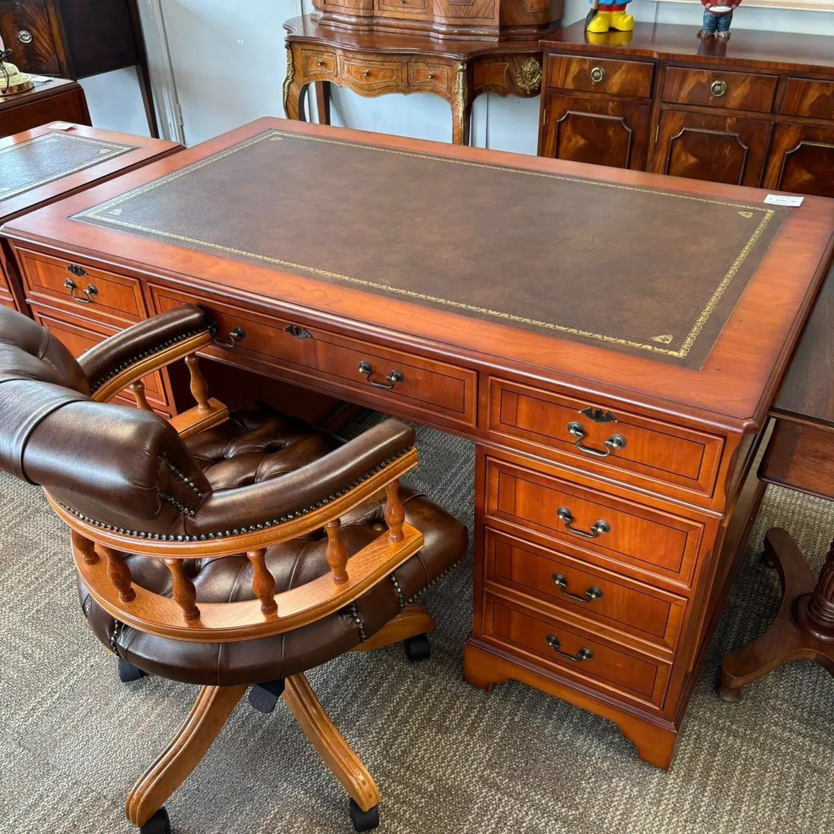 Twin pedestal writing desk with a tan leather top - Image 1