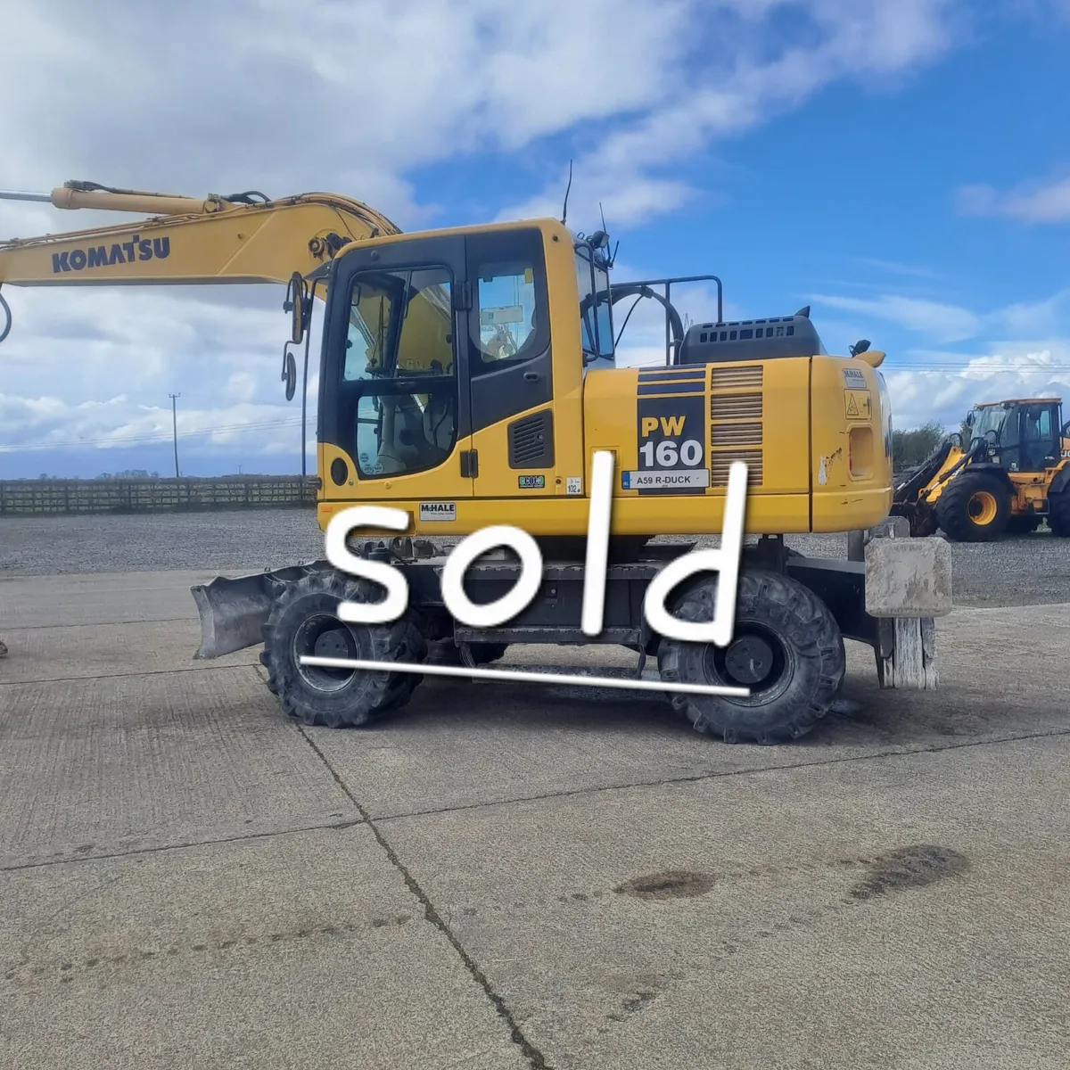 Komatsu  PW 160 rubber duck - Image 1
