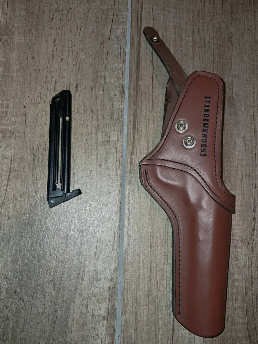 Pistol holster and magazine - Image 2