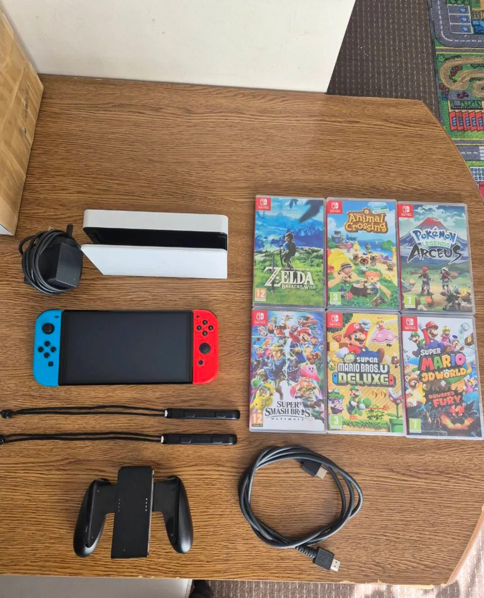 Nintendo switch oled + Game - Image 1