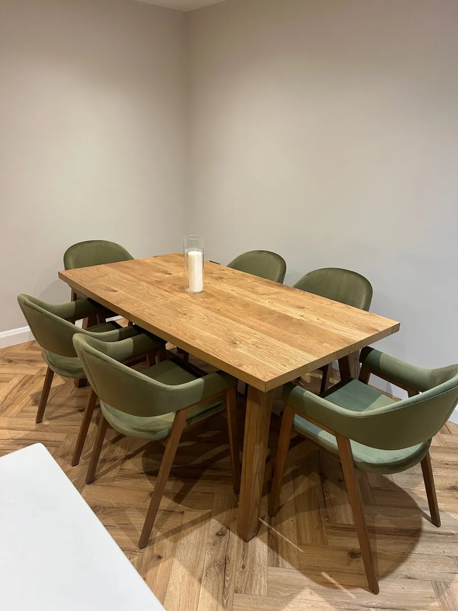 Extendable oak dining table, 6 olive green chairs - Image 1