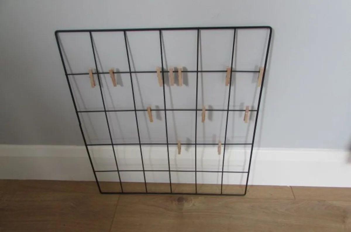 Black Metal Wall Grip with Wooden Pegs for Sale - Image 1