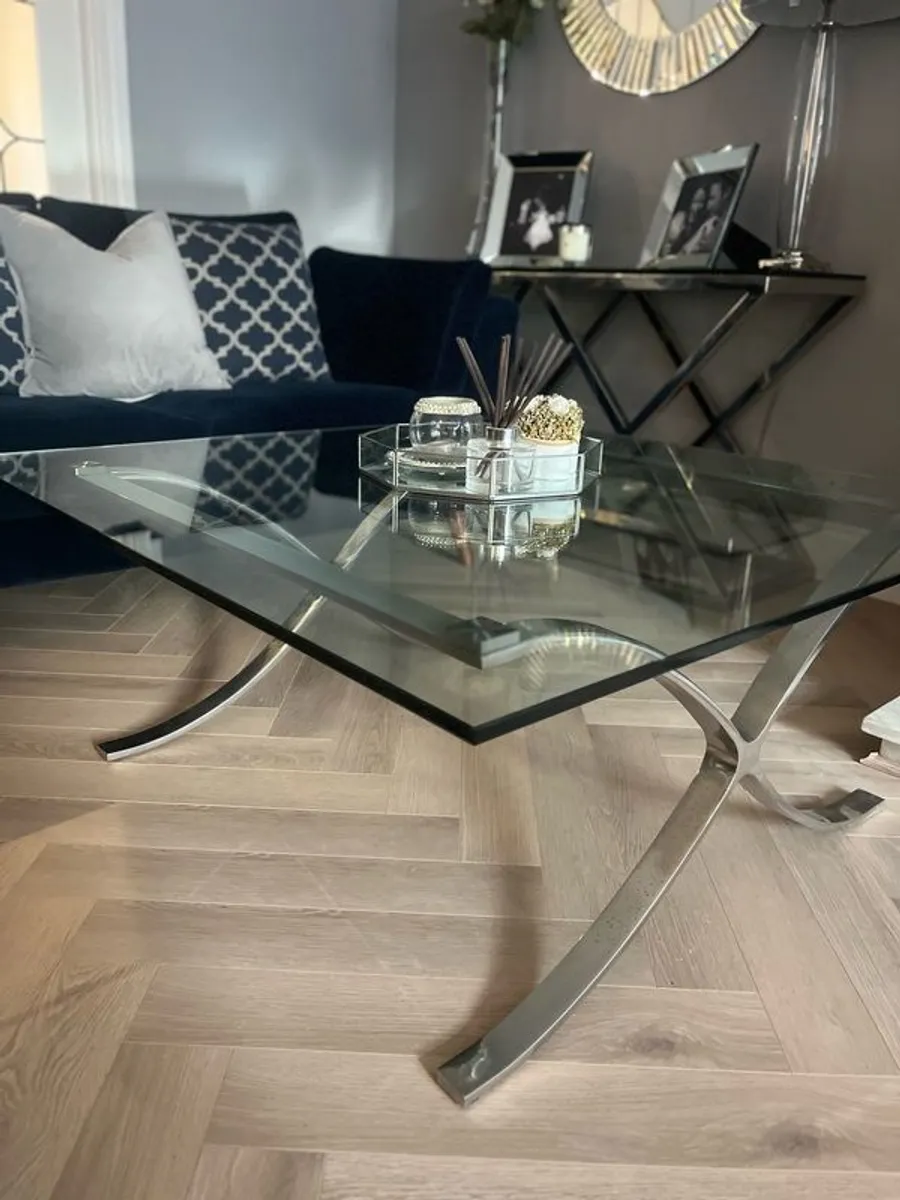 Glass coffee table with chrome legs - Image 1