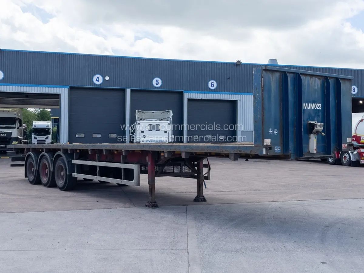 2013 SDC FLATBED TRAILER - Image 1