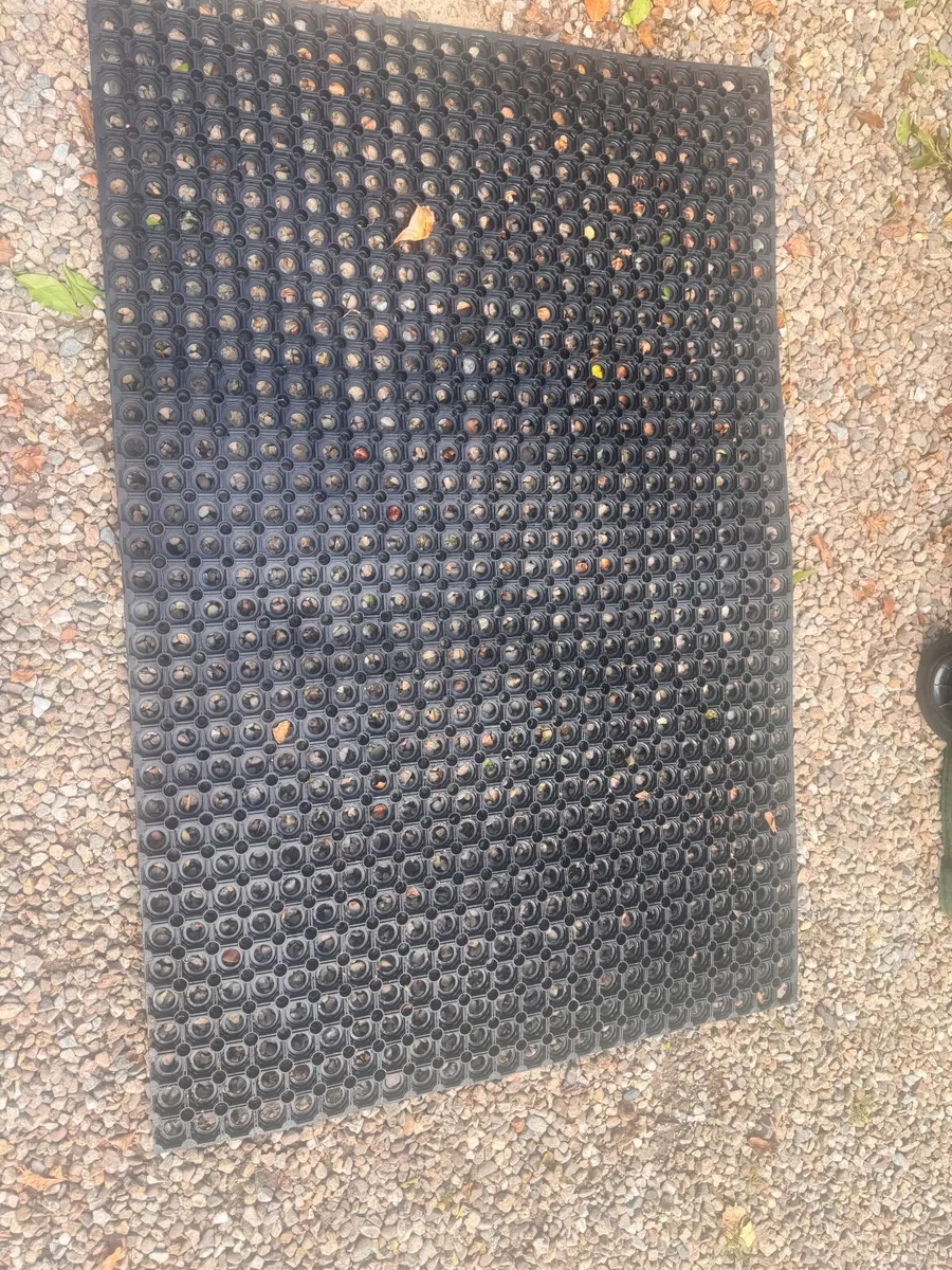 Black rubber mat with holes (1.5meter x 1 meter) - Image 1