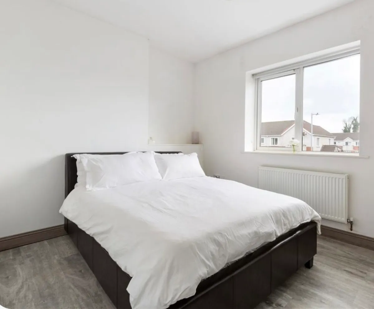 Black faux leather double bed frame