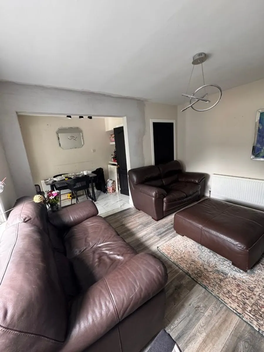 2 leather sofa and puff - Image 1