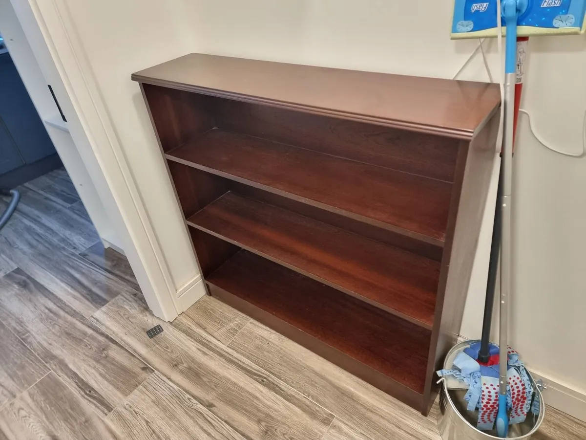 Brown wooden bookshelf - Image 1
