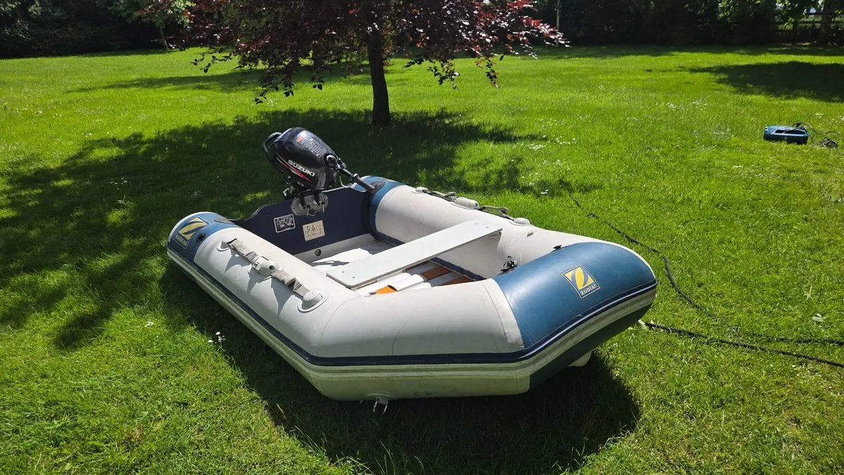 2.5HP Suzuki  Outboard and Zodiac Inflatable - Image 1
