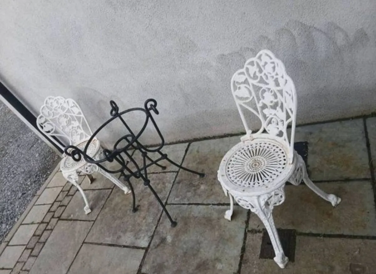 Two heavy garden chairs and table - Image 1