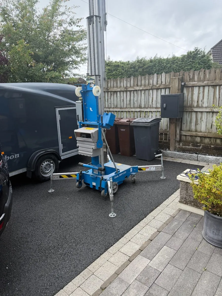 Genie AWP-25S push-around vertical work lift - Image 1