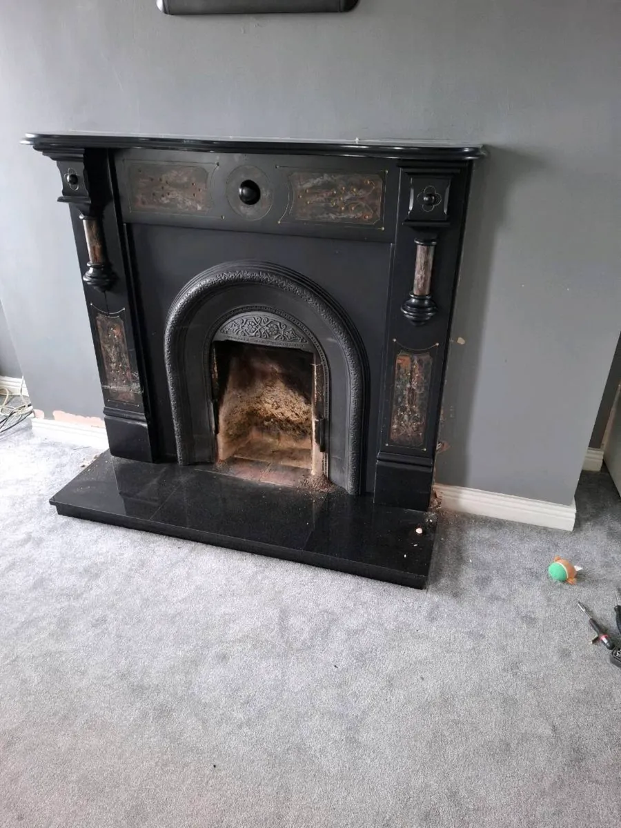 Marble Fireplace with cast insert. - Image 1