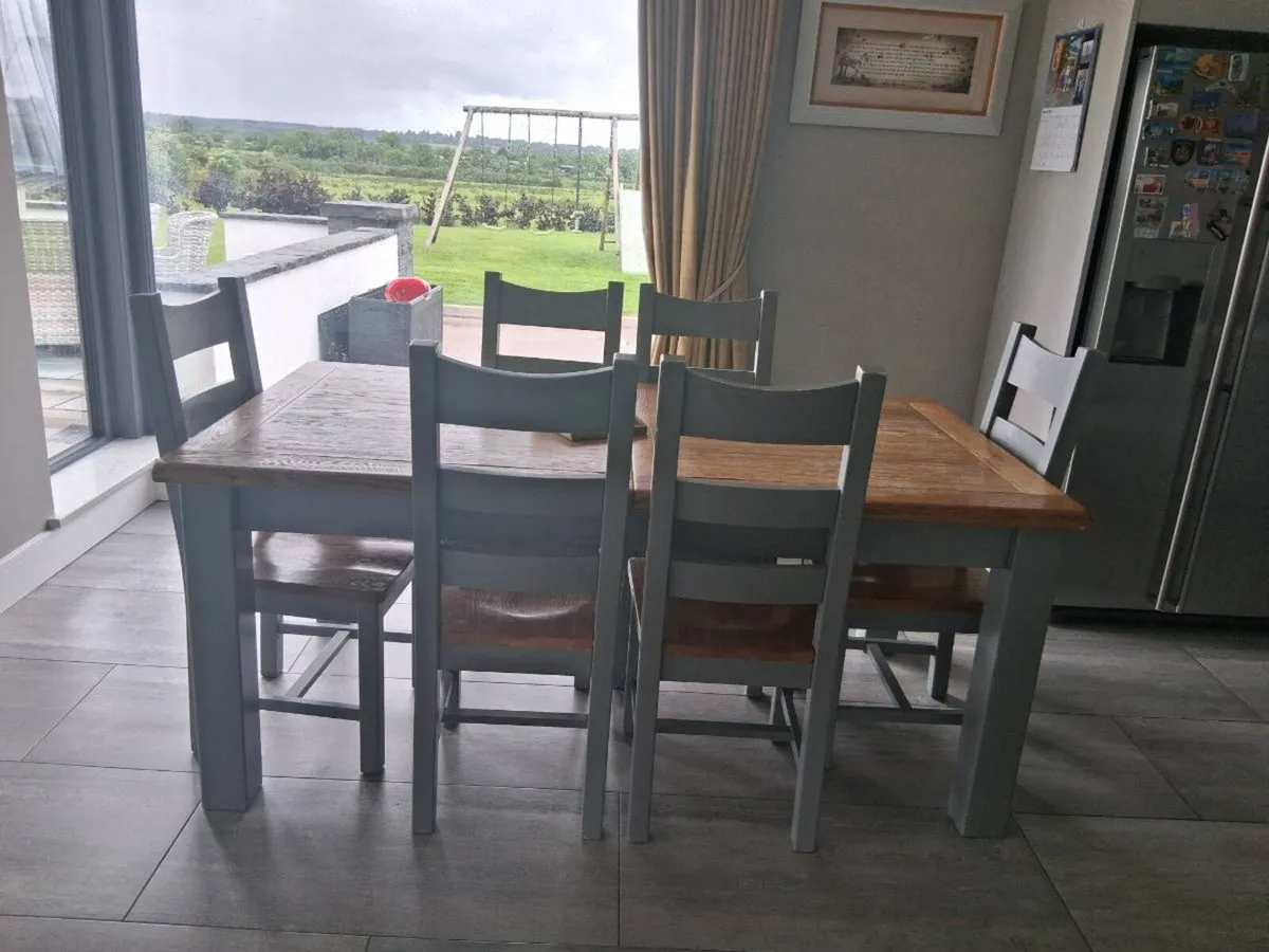 Solid wood table + 6  chairs - Image 1
