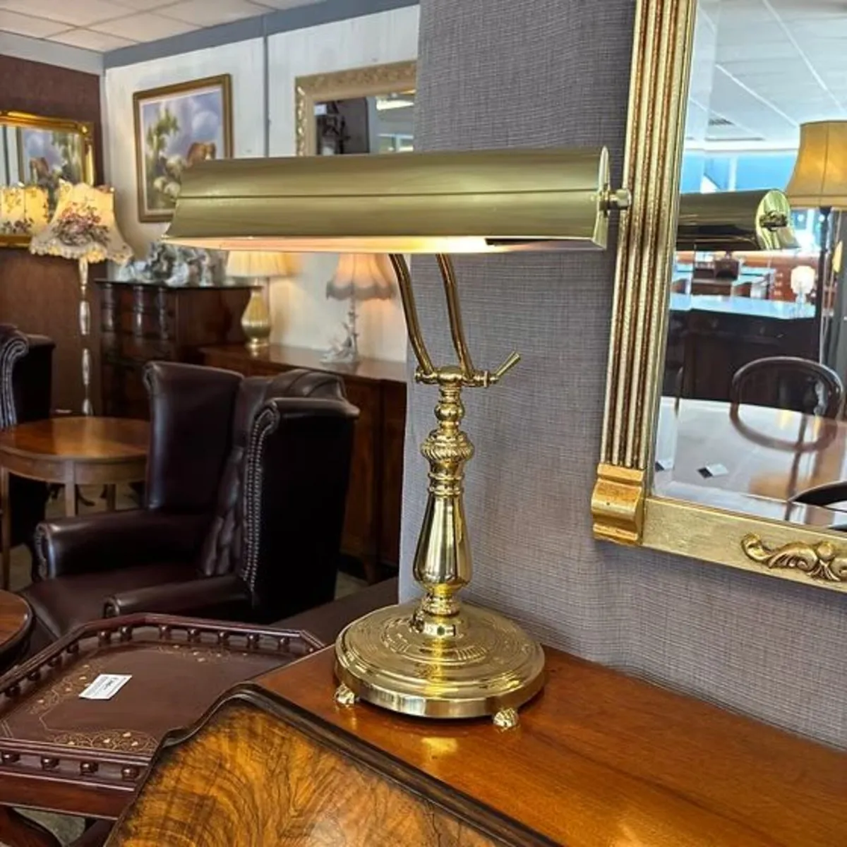 Vintage banker's desk lamp is a polished brass