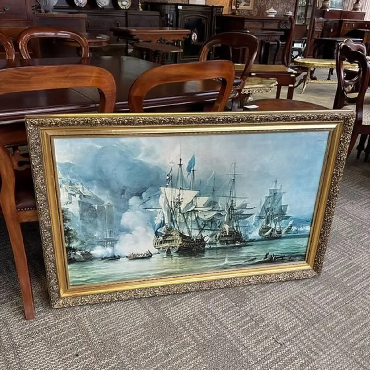 "Naval battle scene" print on canvas. Mounted gilt
