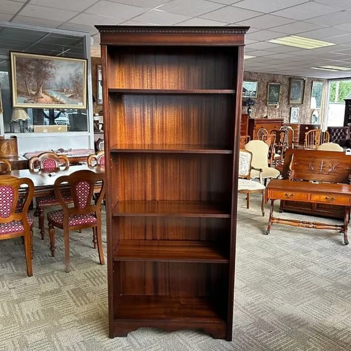 Fabulous open mahogany bookcase with four shelves.