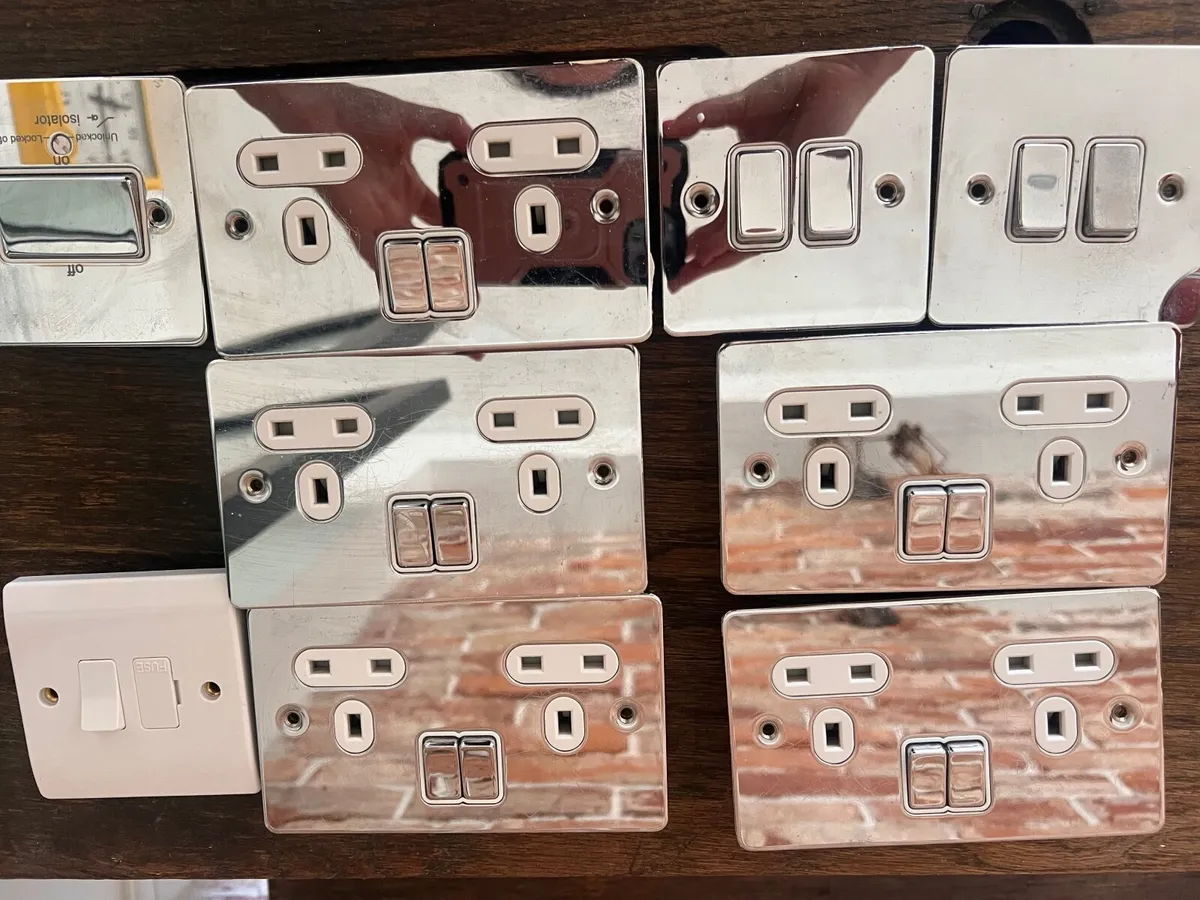 Bundle of chrome electrical sockets and seitches