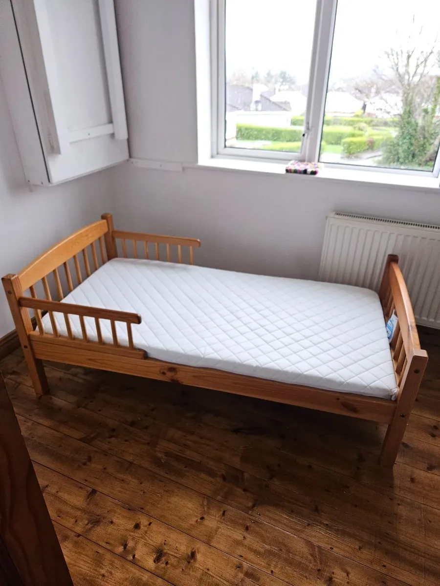 Wooden toddler bed and mattress - Image 1