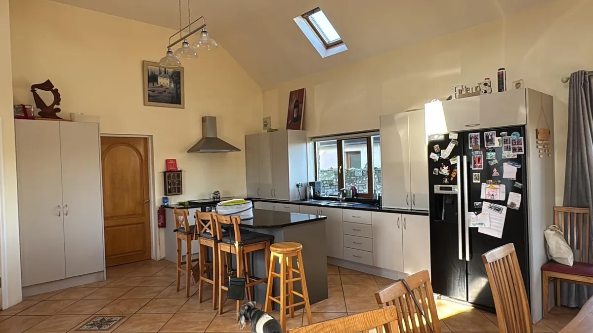 Kitchen units and island - Image 1