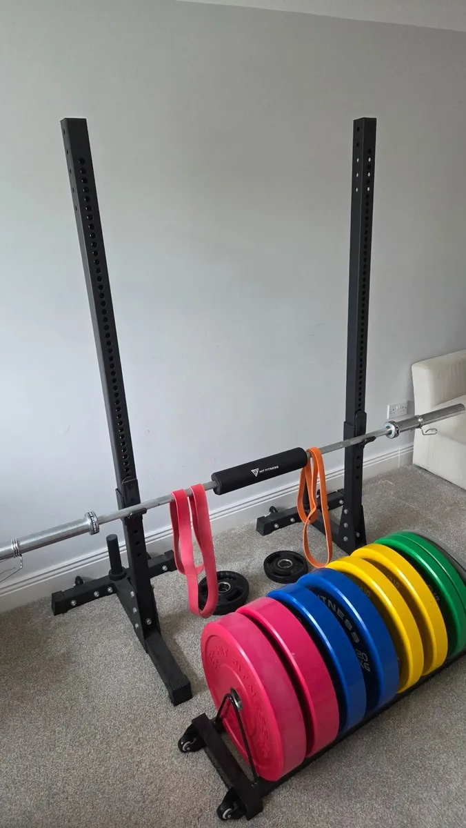 Bumper plates, barbell and rack - Image 1