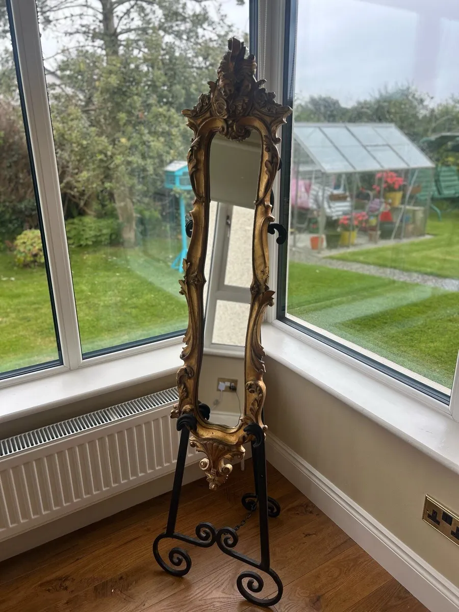 Antique mirror and iron stand