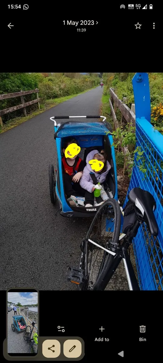 Thule bike trailor for kids - Image 1