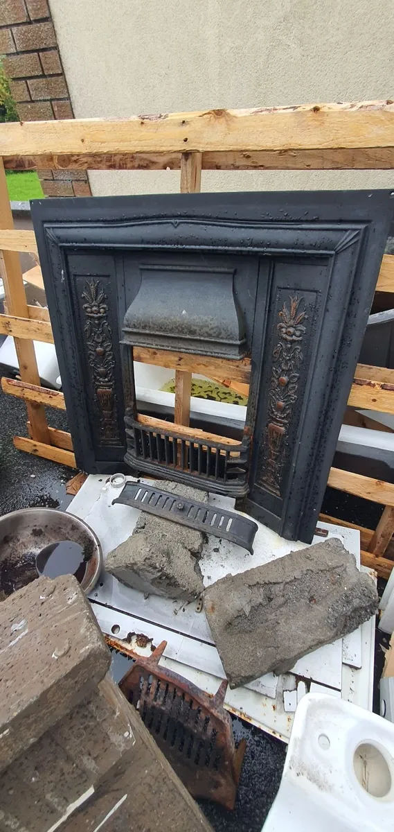 Cast Iron fire surround.