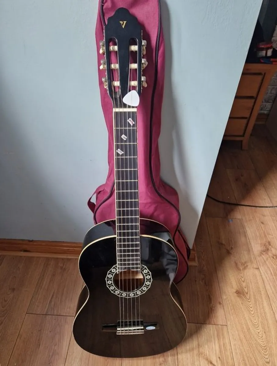 Acoustic Guitar - Image 1
