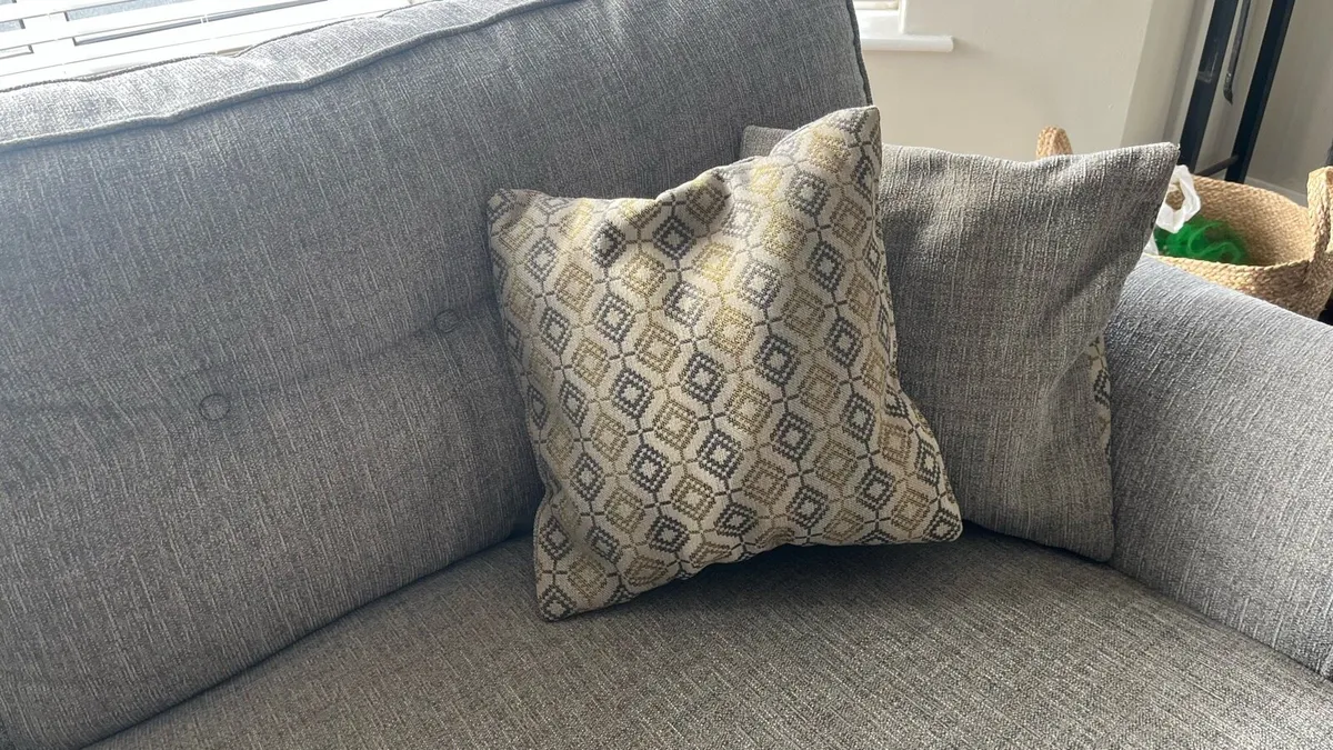 L shape couch with pouffe and matching cushions - Image 3