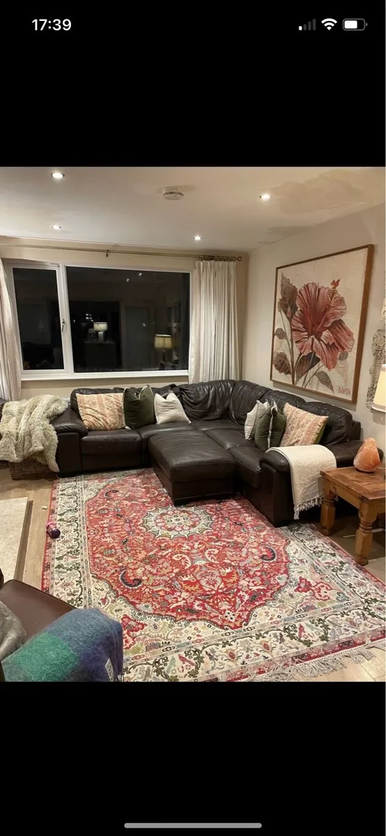 Brown leather L shaped sofa