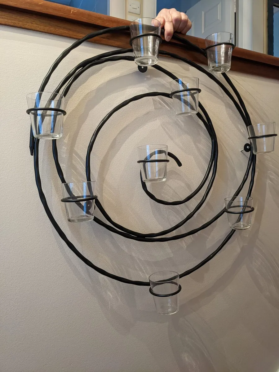 Spiral wall candle holder