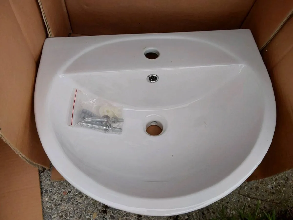 Selection of brand new sinks taps and waste outlet - Image 3