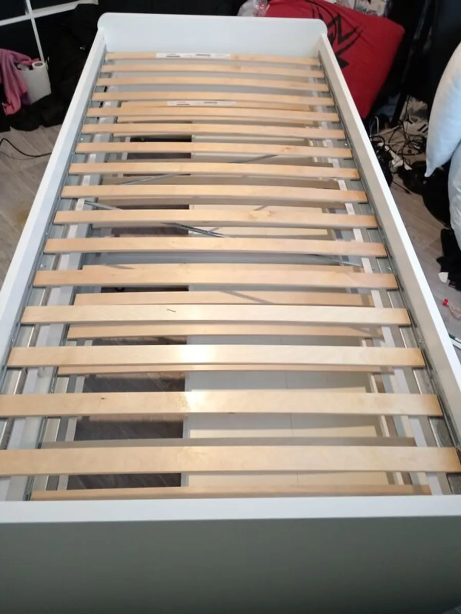 White single bed with underneath pull out bed and 2 storage draws - Image 1