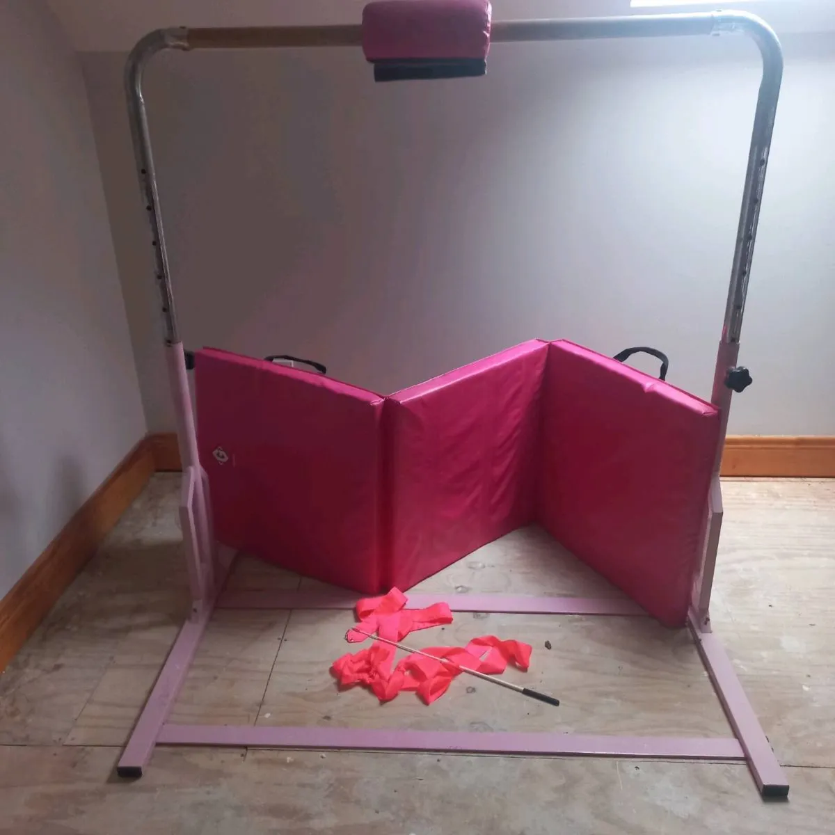 Gymnasts Bar and Mat - Image 1