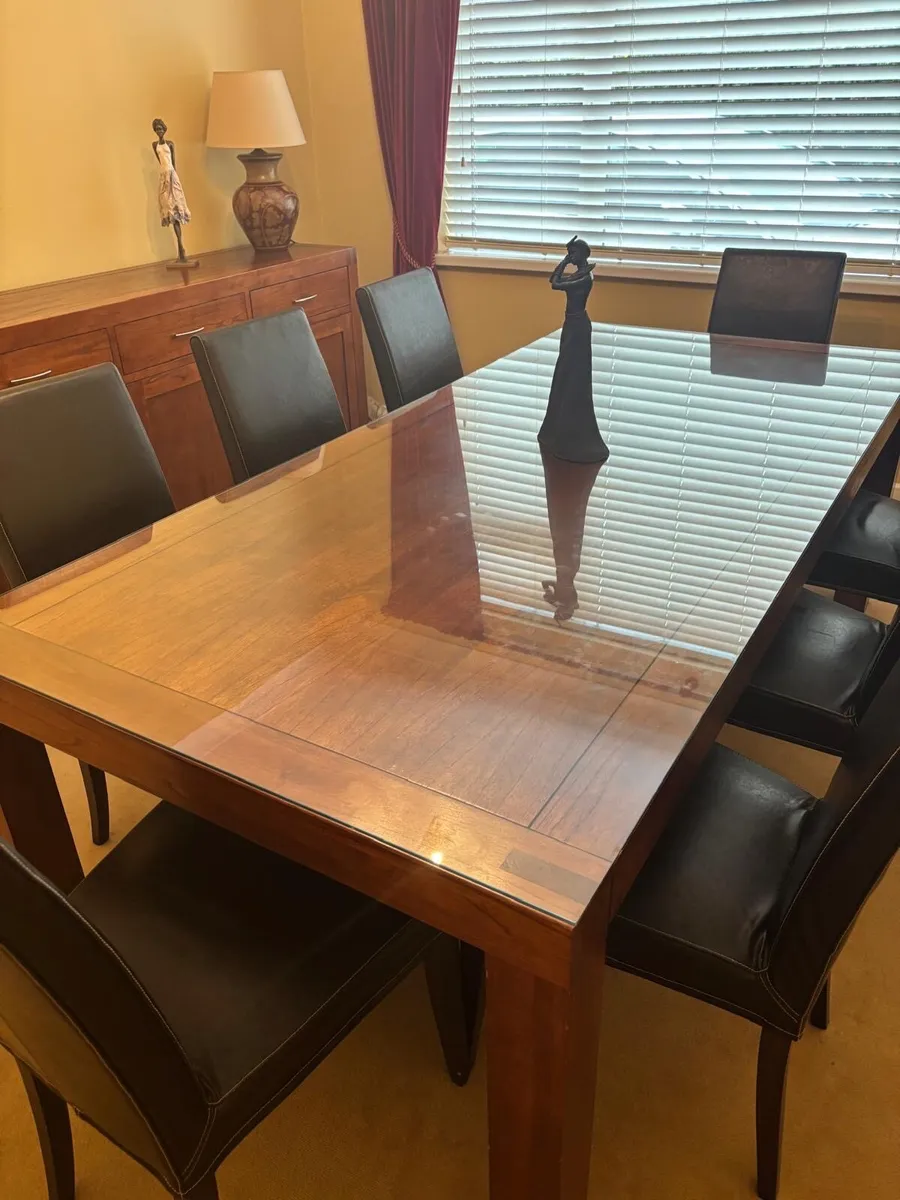 African Hardwood Dining Table and Leather Chairs - Image 1