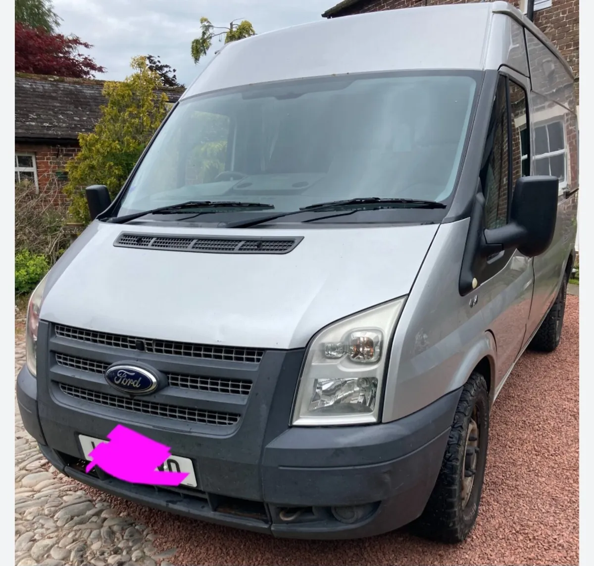 Silver 2012 Transit for breaking