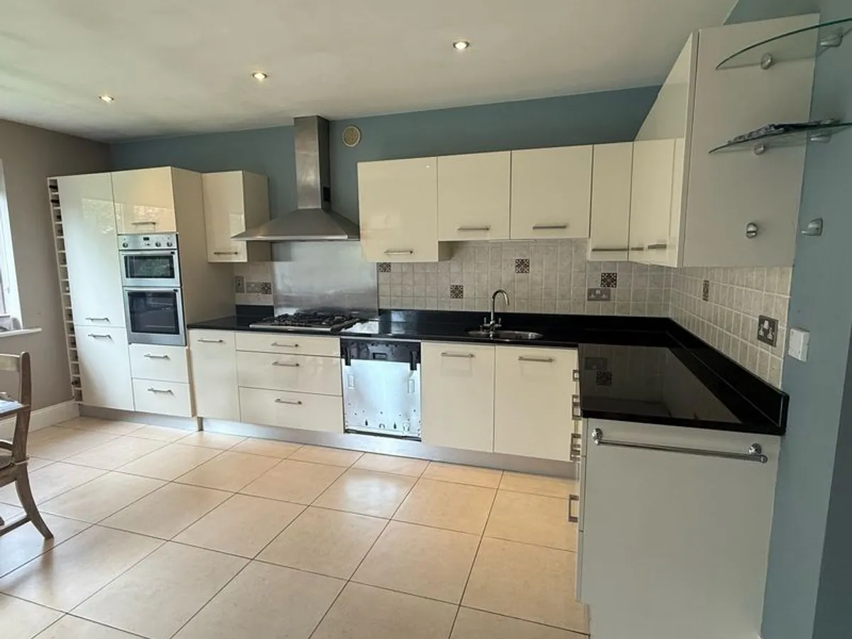 Complete Fitted Kitchen with Neff Appliances and Stone Worktops - Image 1