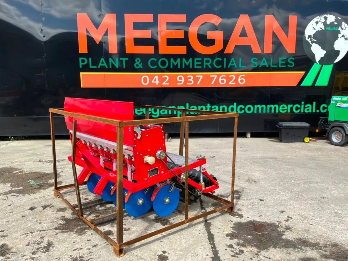 UNUSED 9 ROW GROUND DRIVEN SEED PLANTER. - Image 1