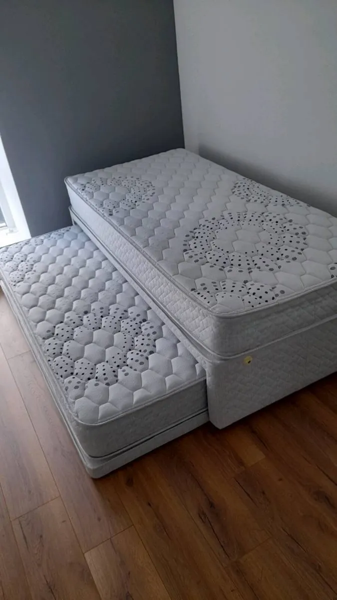 Single bed with fold in second single bed - Image 1