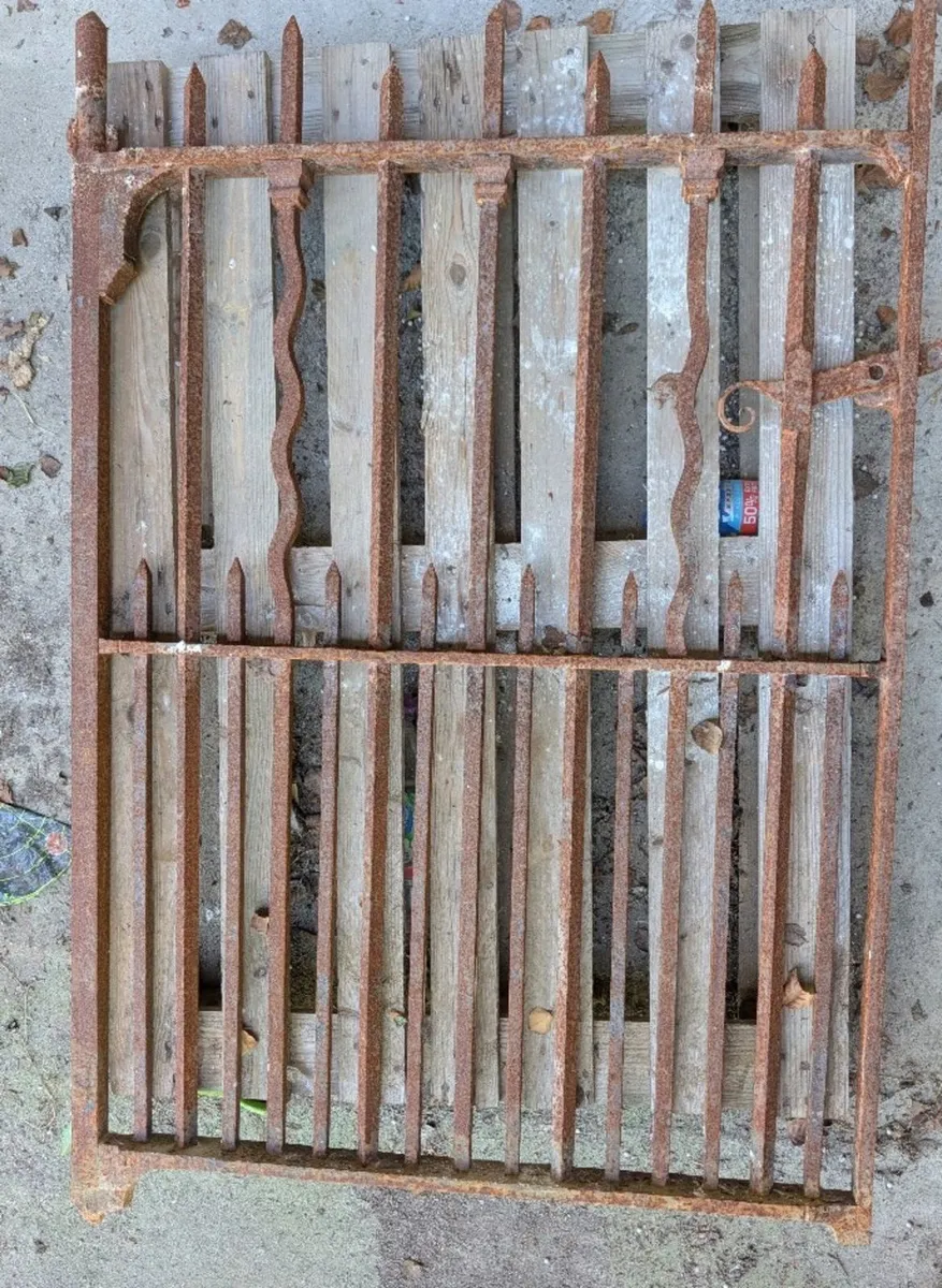 Original antique wrought iron side entrance gate.