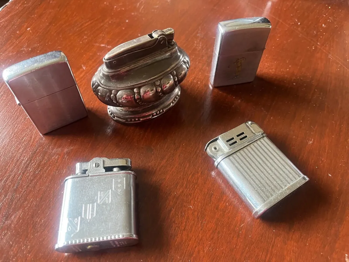 collection of vintage cigarette lighters