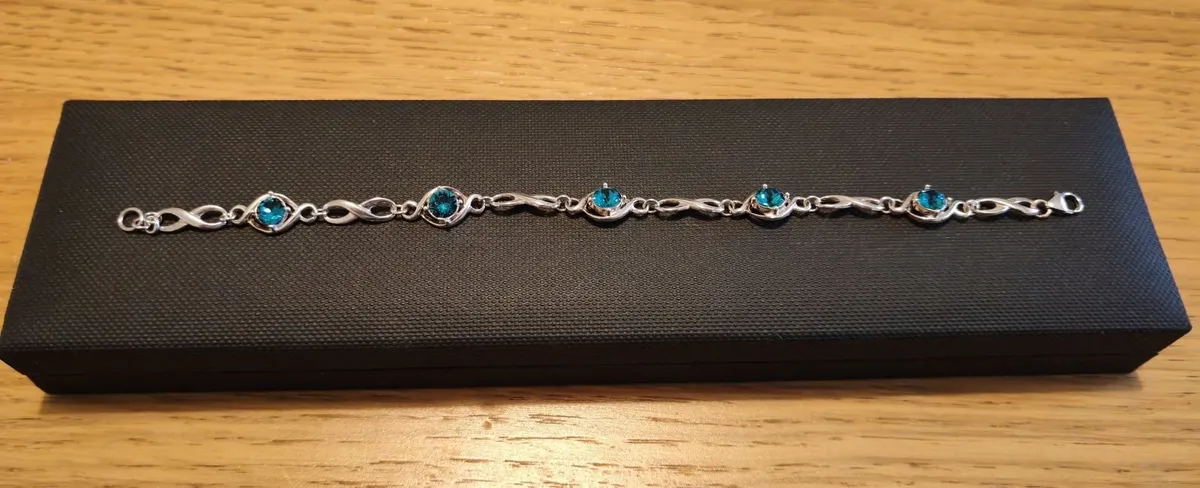 H. Samuel Sterling Silver Blue Topaz Bracelet - Image 1