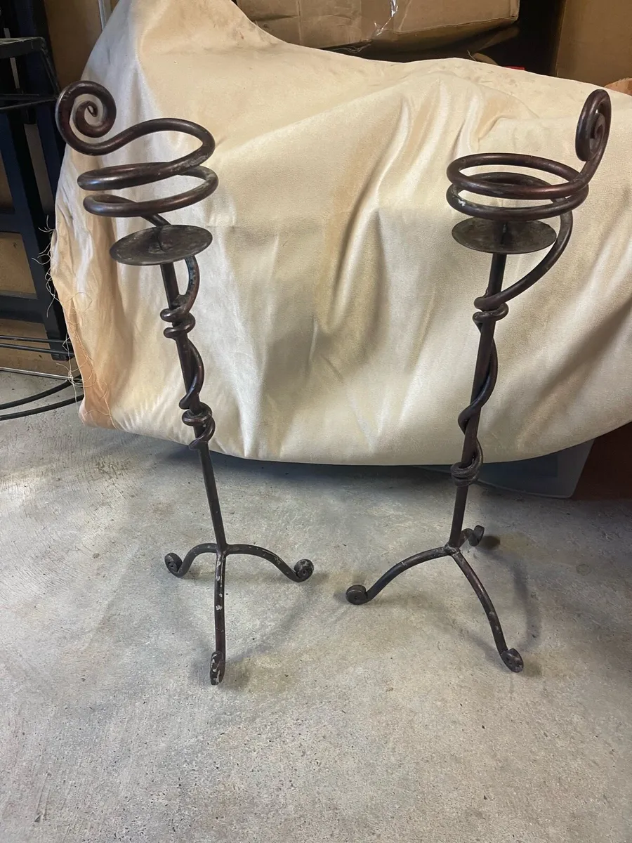 1 pair of Wrought iron candle sticks